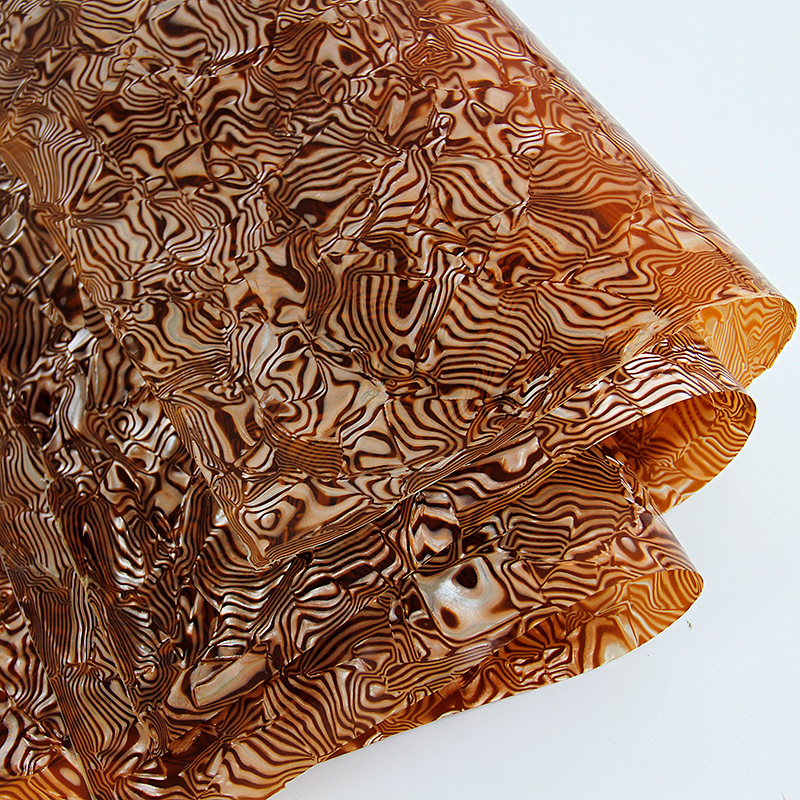 廠家直銷賽璐珞板材貝殼理石賽璐璐廠家直銷訂制貝殼理石鼓皮貼面飾品裝飾建材家具貼面膜-九江賽璐珞實業(yè)有限公司