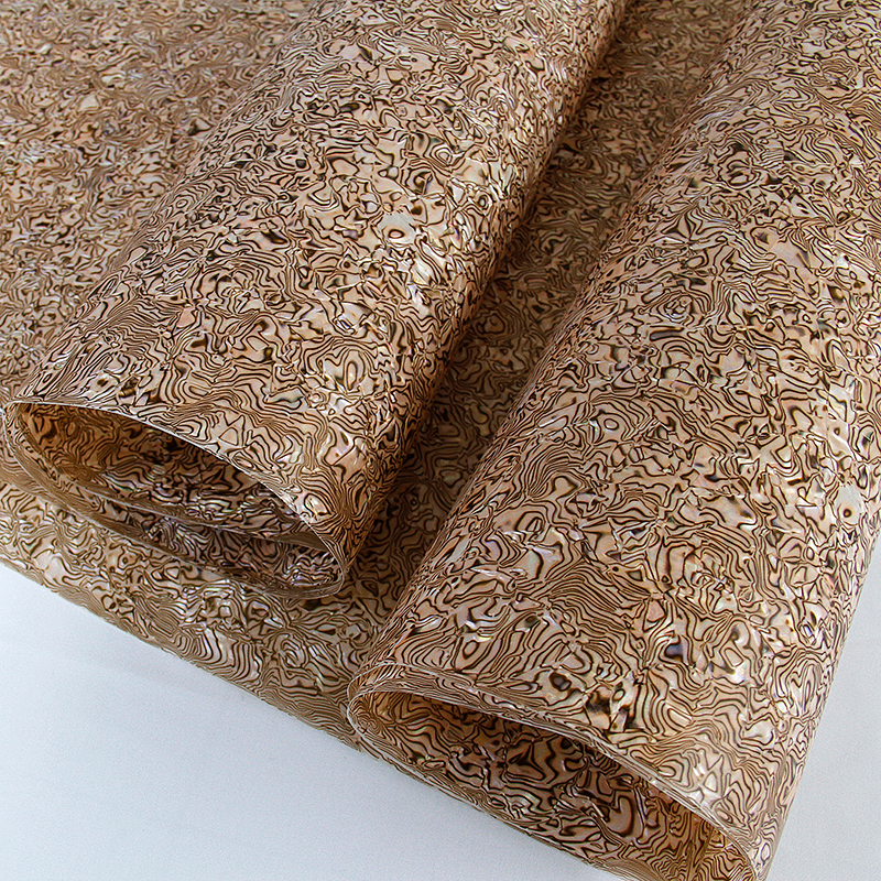 廠家直銷賽璐珞板材貝殼理石賽璐璐廠家直銷訂制貝殼理石鼓皮貼面飾品裝飾建材家具貼面膜-九江賽璐珞實業(yè)有限公司